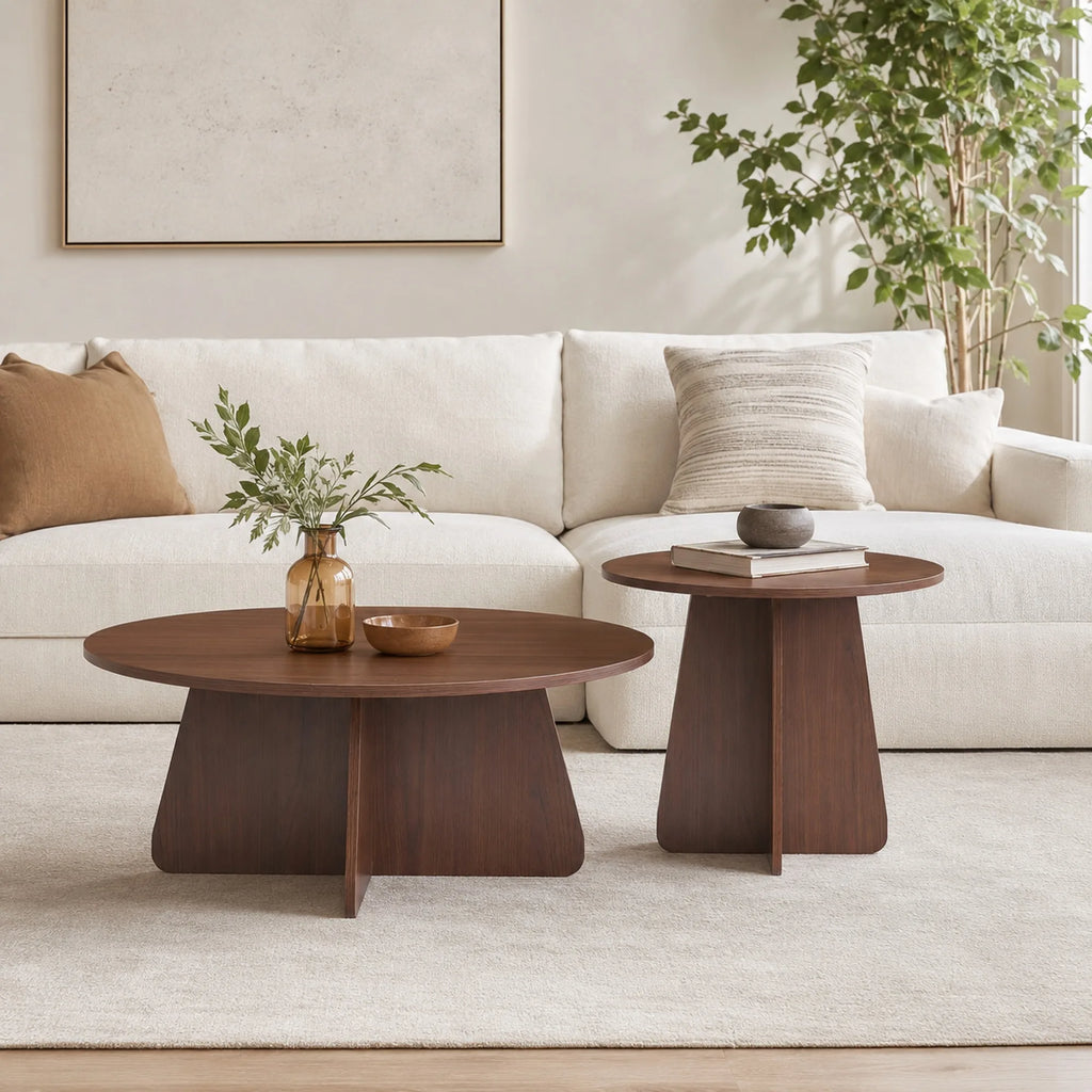 Retro-style nesting coffee table set. Available in walnut or natural wood finishes. Round nesting side tables with crisscross le