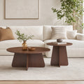 Retro-style nesting coffee table set. Available in walnut or natural wood finishes. Round nesting side tables with crisscross le