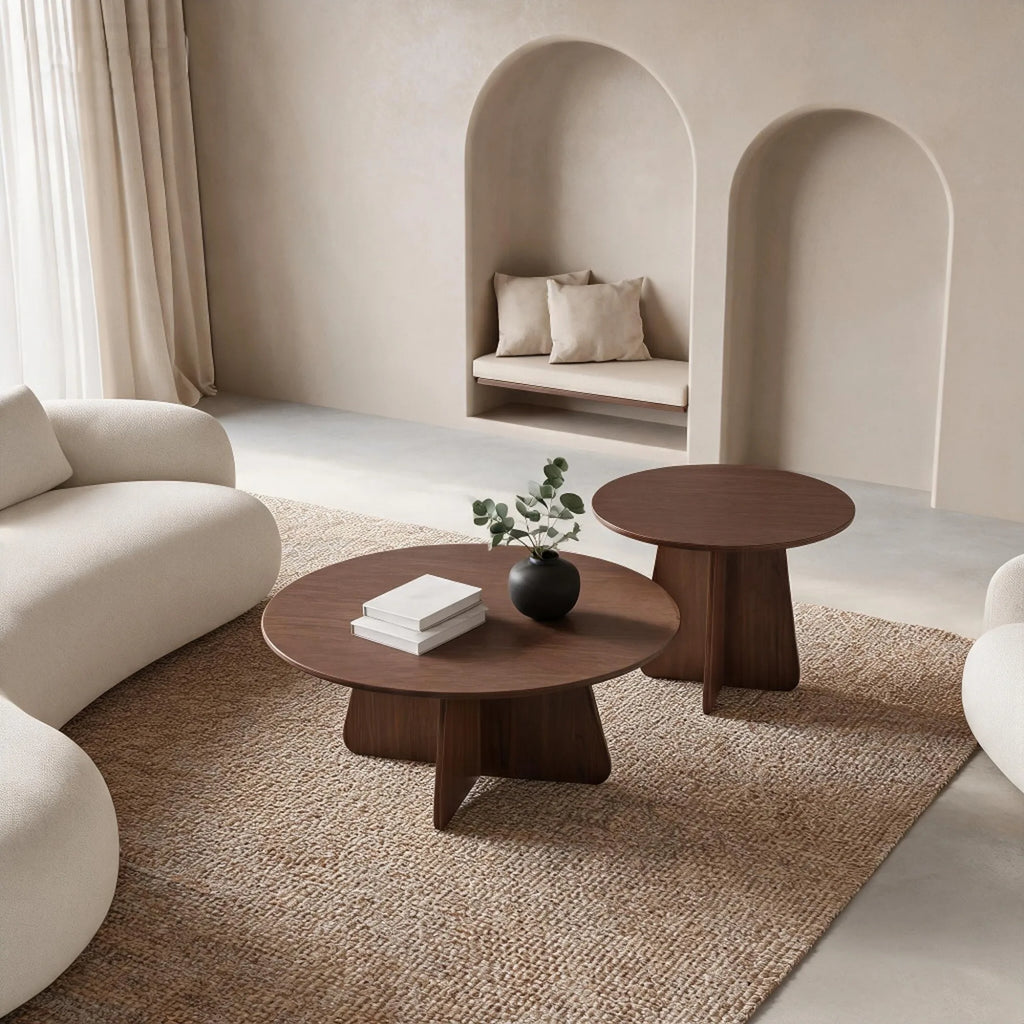 Retro-style nesting coffee table set. Available in walnut or natural wood finishes. Round nesting side tables with crisscross le
