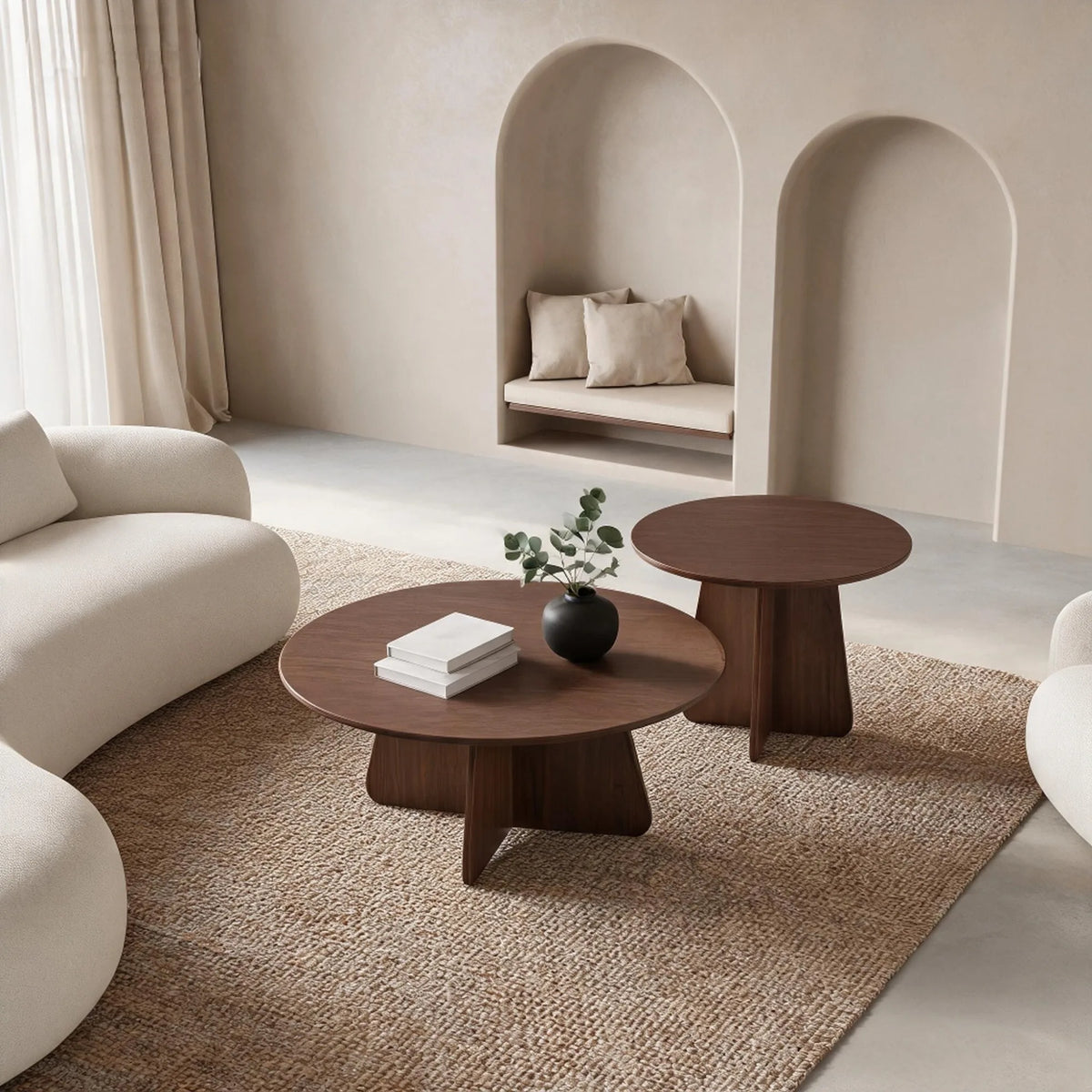 Retro-style nesting coffee table set. Available in walnut or natural wood finishes. Round nesting side tables with crisscross le